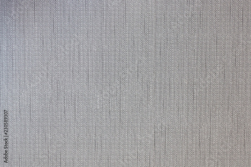grey color woven fabric clothes background .