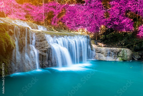 Amazing in nature, wonderful waterfall at autumn forest in fall season. 