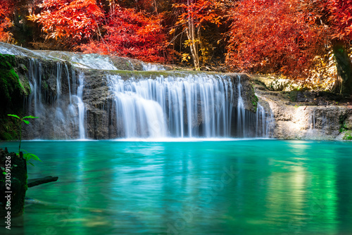Fototapeta Naklejka Na Ścianę i Meble -  Amazing in nature, wonderful waterfall at autumn forest in fall season. 