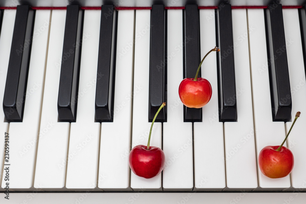 Piano chord Fm (F minor) shown by cherries on the key - 6/12 of minor  series Photos | Adobe Stock