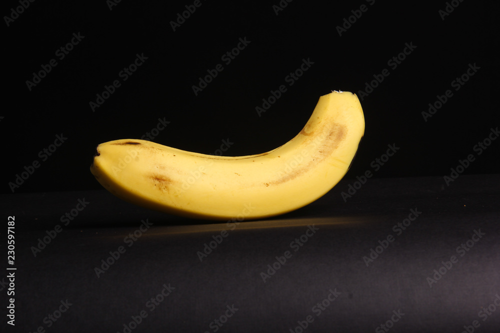 yellow bananas on the black background yellow bananas on the black background