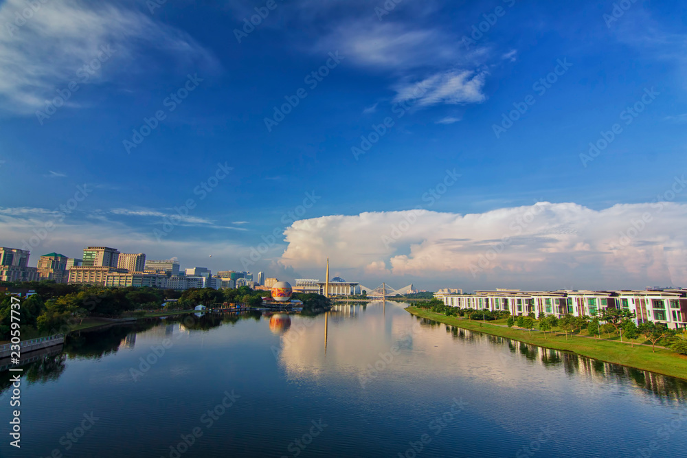 Beautifull view of Putrajaya with housing on the right and administrative office on the left side of the lake