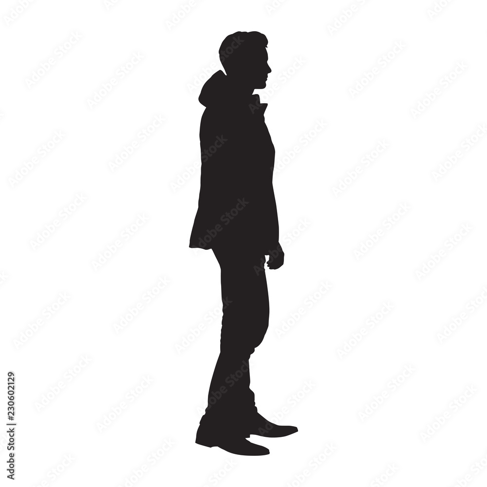 Standing man in winter jacket, isolated vector silhouette. Side view