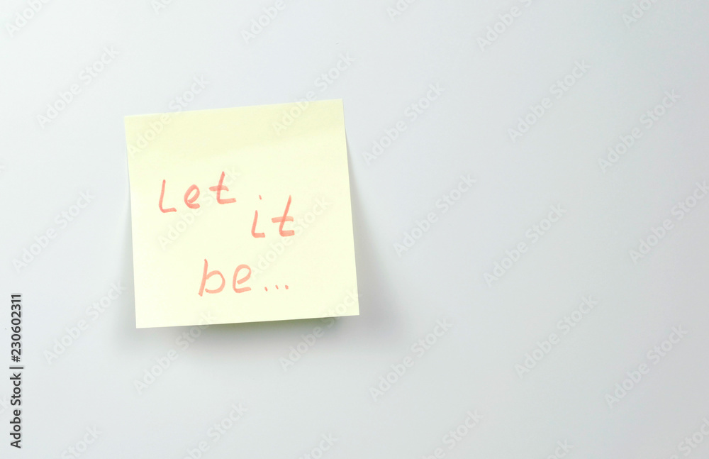 Note on yellow sticker paper sheets with motivation words let it be Note on yellow sticker paper sheets with motivation words let it be