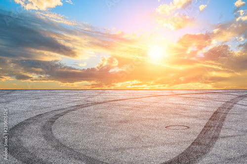 Car track square and sky beautiful cloud scenery at sunset