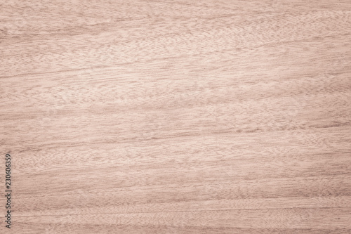 Old plywood textured wooden background or wood surface of the bright brown at grunge dark grain wall texture of panel top view. Vintage teak surface board at desk texture with light pattern natural.