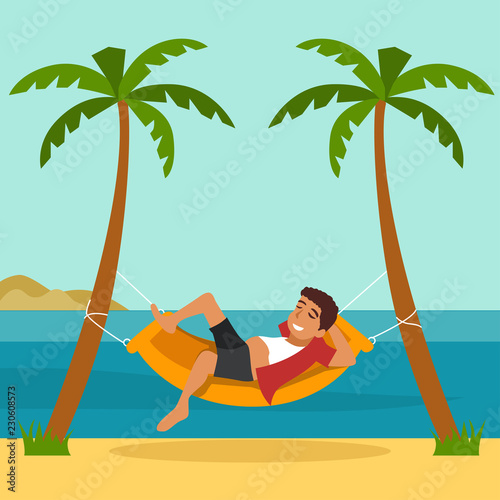 Indian boy leaning in hammock at the beach