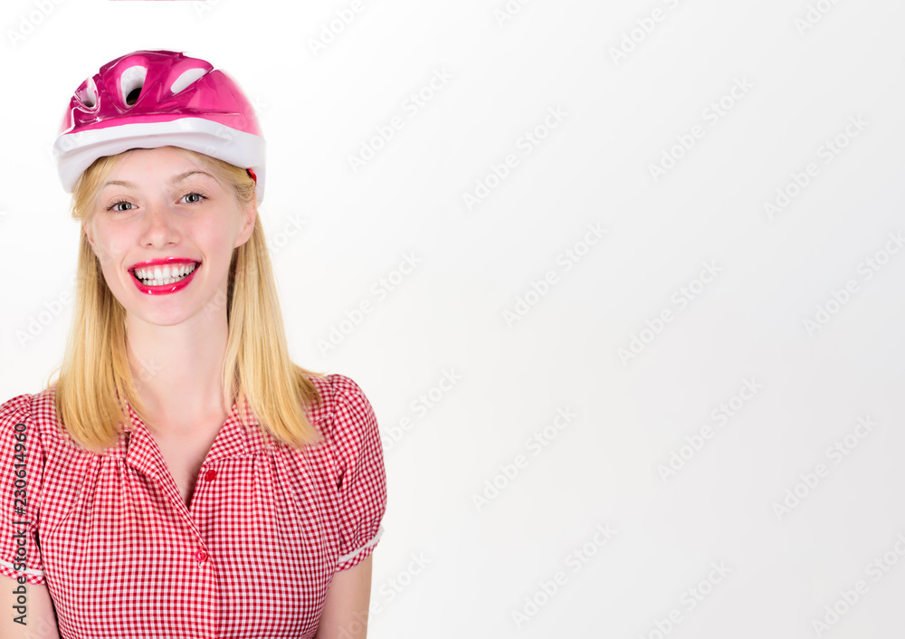 Beautiful woman in bicycle helmet. Sportswoman in protective helmet. Healthy and active concept. Sport athlete girl in stylish pink skating helmet. Copy space for advertise sport attributes store/shop Beautiful woman in bicycle helmet. Sportswoman in protective helmet. Healthy and active concept. Sport athlete girl in stylish pink skating helmet. Copy space for advertise sport attributes store/shop