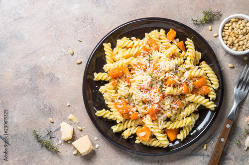 Pumpkin pasta with thyme, cream sauce and parmesan.