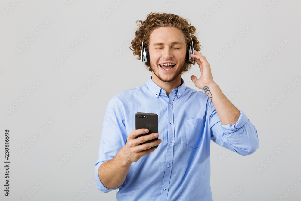 Portrait of a joyful young man with curly hair Portrait of a joyful young man with curly hair