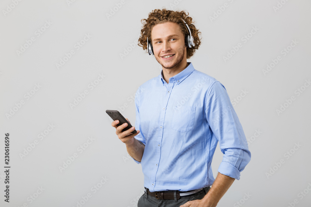Portrait of a happy young man with curly hair isolated Portrait of a happy young man with curly hair isolated