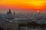 Budapest, Hungary - Beautiful golden sunrise over Budapest with St. Stephen's Basilca and the skyline of Pest