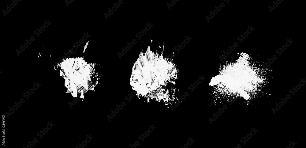 three white abstract paint strokes isolated on black surface isolated f three white abstract paint strokes isolated on black surface isolated f