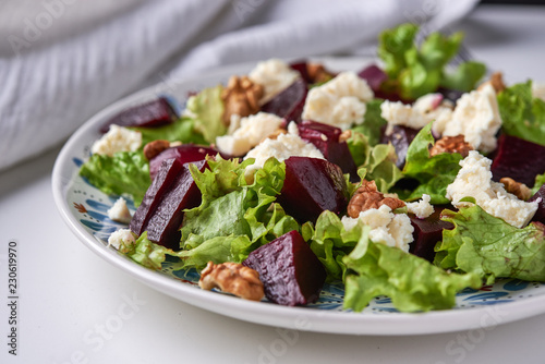 salad eith beetrooy, cheese and nuts photo