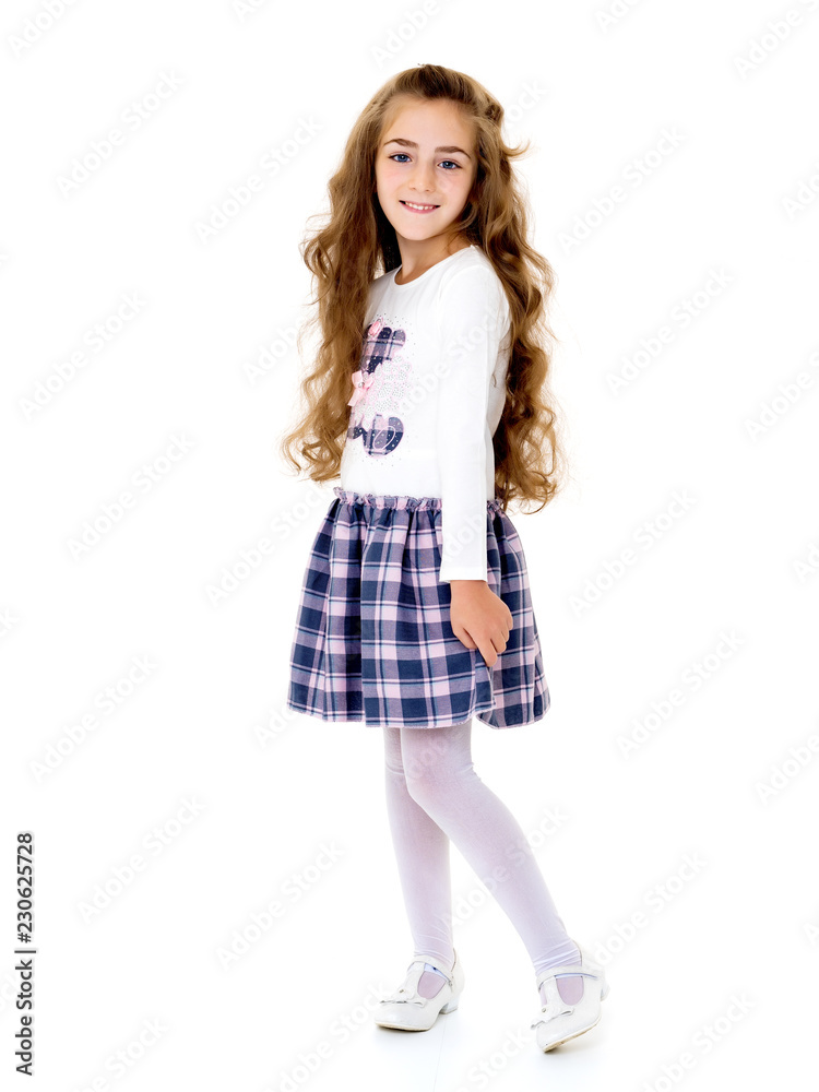 Fototapeta premium Beautiful school girl with long silky hair.