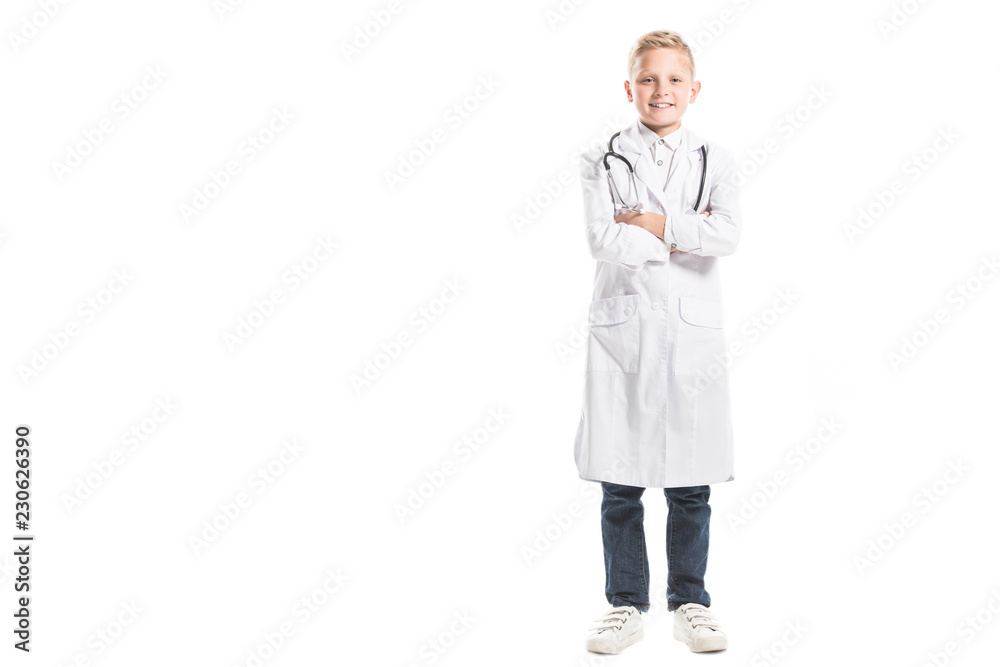 smiling preteen boy in doctors white coat with stethoscope isolated on white smiling preteen boy in doctors white coat with stethoscope isolated on white