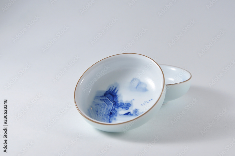 Chinese teaware. Pottery cups with drawins Chinese teaware. Pottery cups with drawins