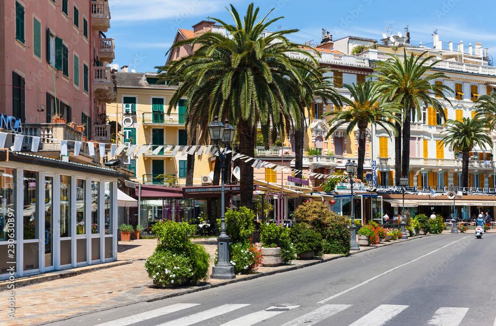 Fototapeta premium Hotels and street cafes at the Lungomare Vittorio Veneto at the port of Rapallo, Italian Riviera