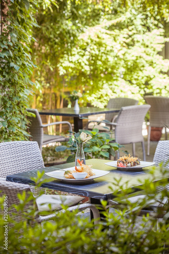 Table for two in the garden of a restaurant