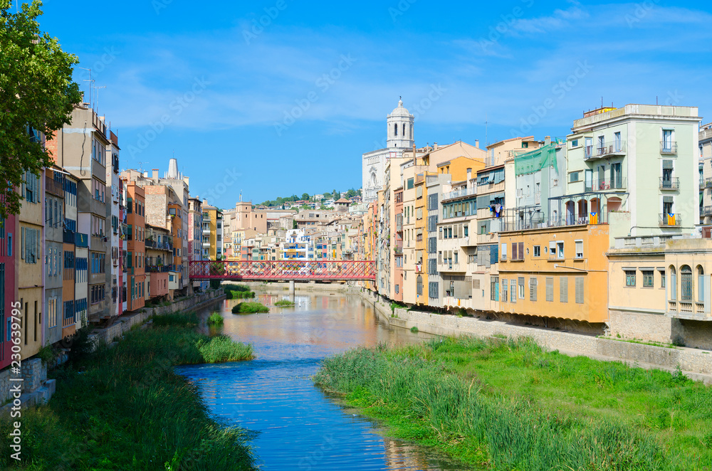 View of Eiffel Bridge (Puente Eiffel, or Pont de les Peixateries Velles) over River Onyar, Cathedral and buildings of Girona, Spain View of Eiffel Bridge (Puente Eiffel, or Pont de les Peixateries Velles) over River Onyar, Cathedral and buildings of Girona, Spain