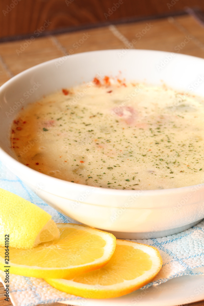 Cream soup in white bowl on the table Cream soup in white bowl on the table