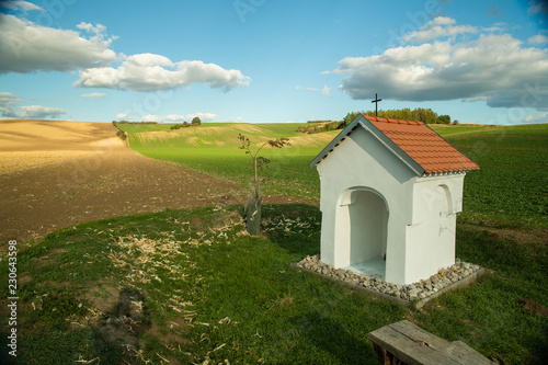 Field in the wine region of Moravian Tuscany. Fields in the vicinity of Svatoborice and Mistrin during autumn days. A gorgeous sky full of clouds, the paths that go between the field. small chapel