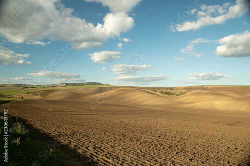 Field in the wine region of Moravian Tuscany. Fields in the vicinity of Svatoborice and Mistrin during autumn days. A gorgeous sky full of clouds, the paths that go between the field.
