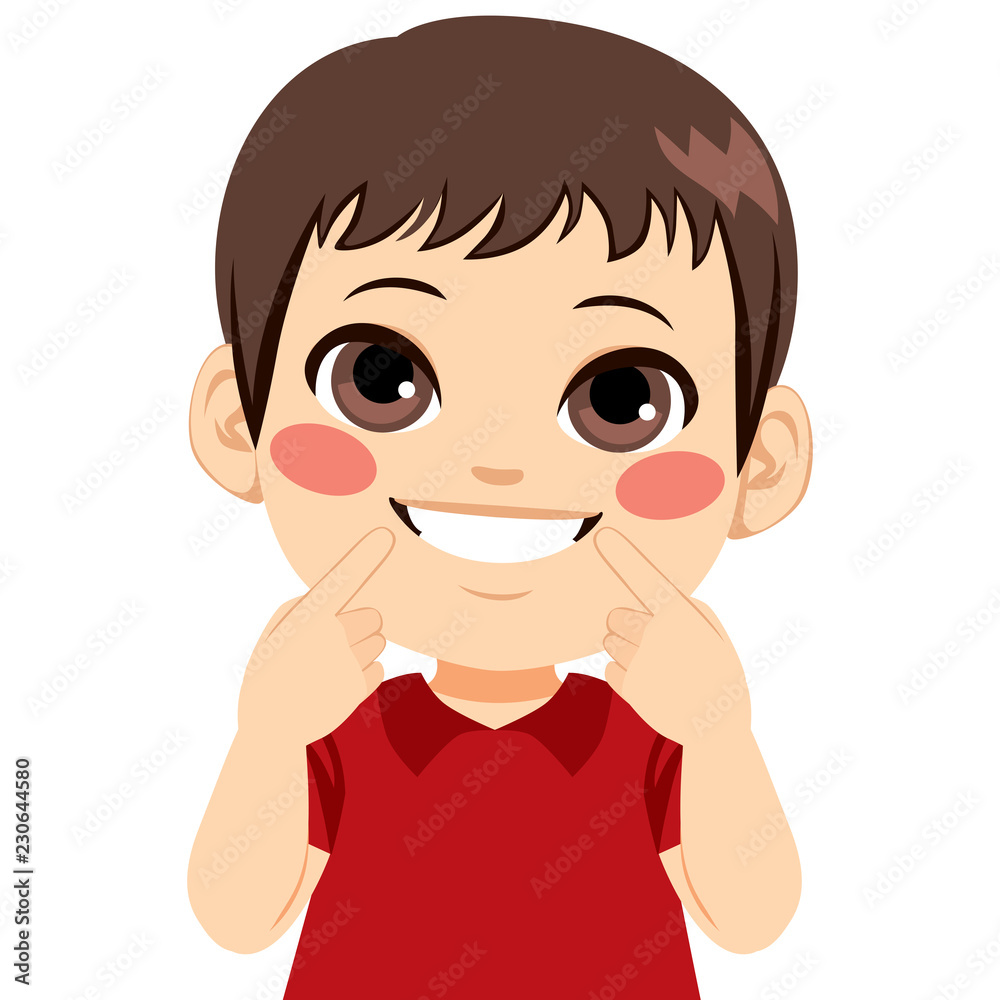 Young happy boy smiling showing his white smile pointing fingers at mouth Young happy boy smiling showing his white smile pointing fingers at mouth
