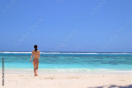 Woman at Beautiful beach in Maldives