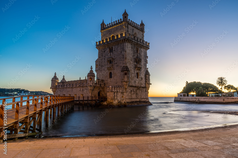 The  Belem Tower (Belém Tower) at sunset.  A medieval castle fortification on the Tagus river of Lisbon Portugal