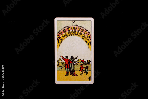 An individual minor arcana tarot card isolated on black background. Ten of cups.