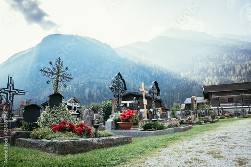Cemetery, moutains and light rays in the background