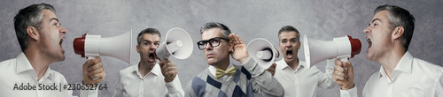 Man listening to a loud noise
