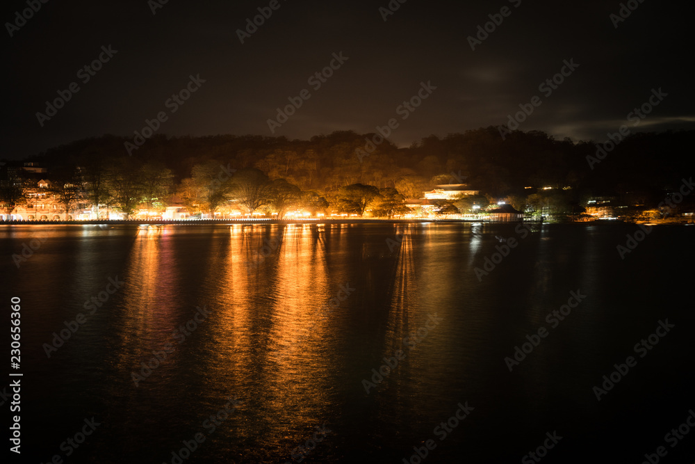 reflections on a lake at night reflections on a lake at night