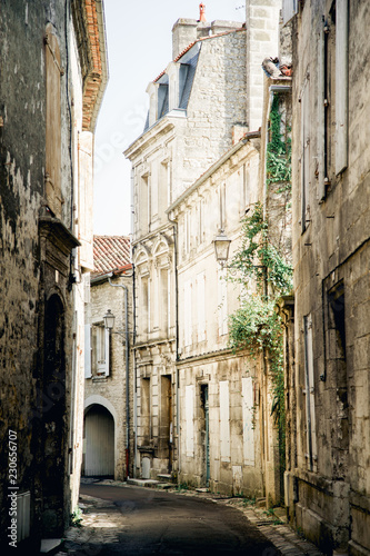 Fototapeta Naklejka Na Ścianę i Meble -  Street view in old french town with traditional architecture