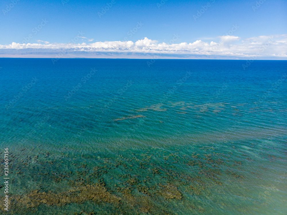 Fototapeta premium The Issyk-kul Lake. Kyrgyzstan, Central Asia. Dron Arial Shoot.