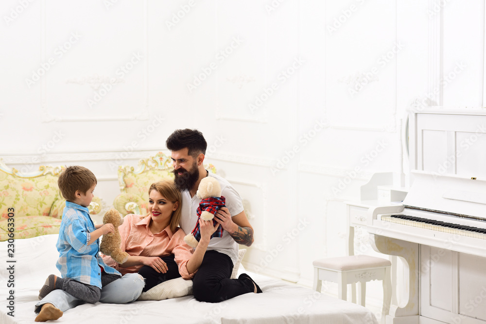 father and mother with child play toys. happy family and childrens day. happy childhood. Care and development. Little boy with dad and mom. little boy play with parents at home. Sincere emotions father and mother with child play toys. happy family and childrens day. happy childhood. Care and development. Little boy with dad and mom. little boy play with parents at home. Sincere emotions