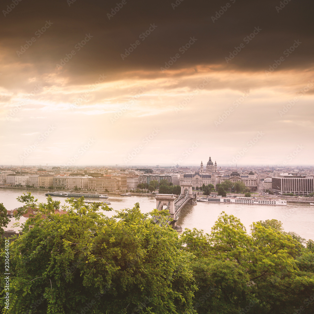 Panoramic view of Budapest from the Buda coast. View of St. Stephen's Basilica and Chain Bridge at sunset. Hungary