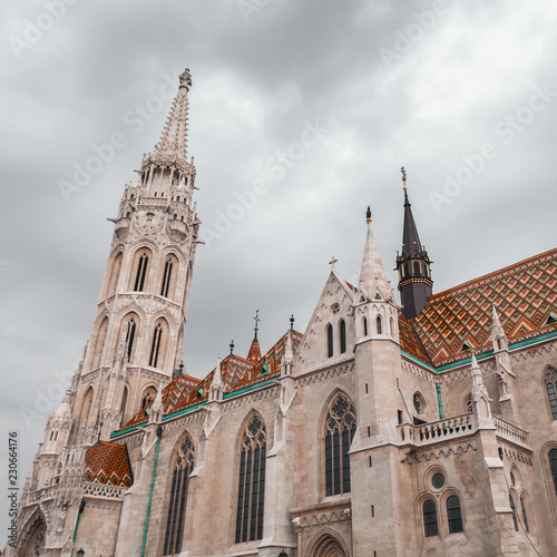 St. Matthias Church in the Fisherman's Bastion in Budapest, Hungary. Cloudy weather, dramatic sky