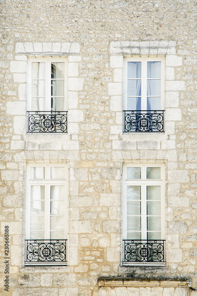 Symmetrical facade of french building at the old town