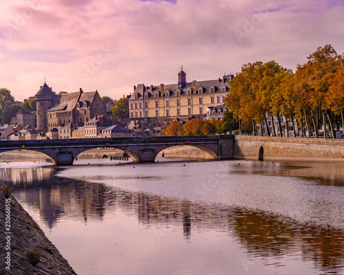 Scenes from Laval France along the Mayenne river with castles and churches © CarlCooley