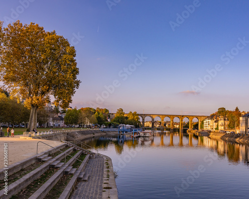 Scenes from Laval France along the Mayenne river with castles and churches