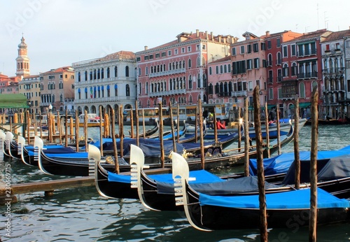 The canal in Venice. Ancient buildings, bridges, boats, reflections in the water