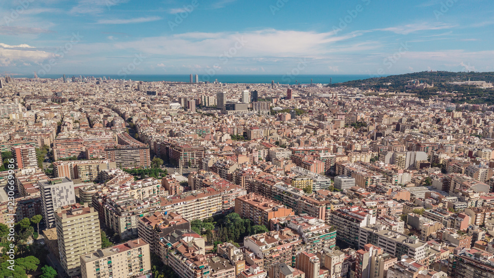 Cityscape of Barcelona at sunny day. Aerial view