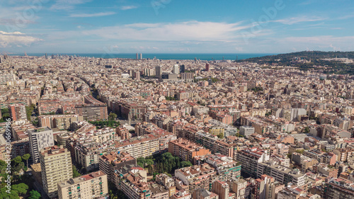 Cityscape of Barcelona at sunny day. Aerial view