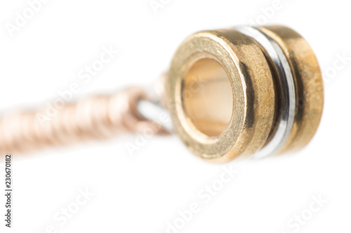 Принти на полотні Extreme close up of the ball end of a guitar string / Very close-up detail of th