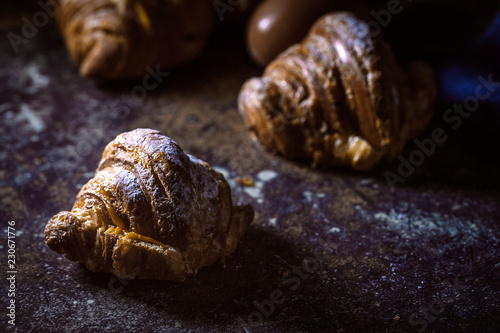 freshly baked buns with almonds. Croissants and brioches