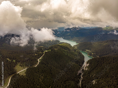 Bolboci Lake near Padina plateau in Bucegi Mountains in the Carpathians and Tatar Gorge photo