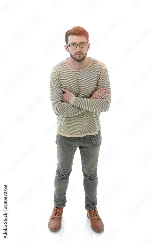 portrait of a serious young man. Photo in full length portrait of a serious young man. Photo in full length