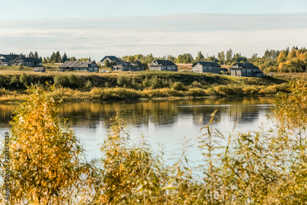 Autumn in the Northern Russian village. Arkhangelsk region. Autumn in the Northern Russian village. Arkhangelsk region.